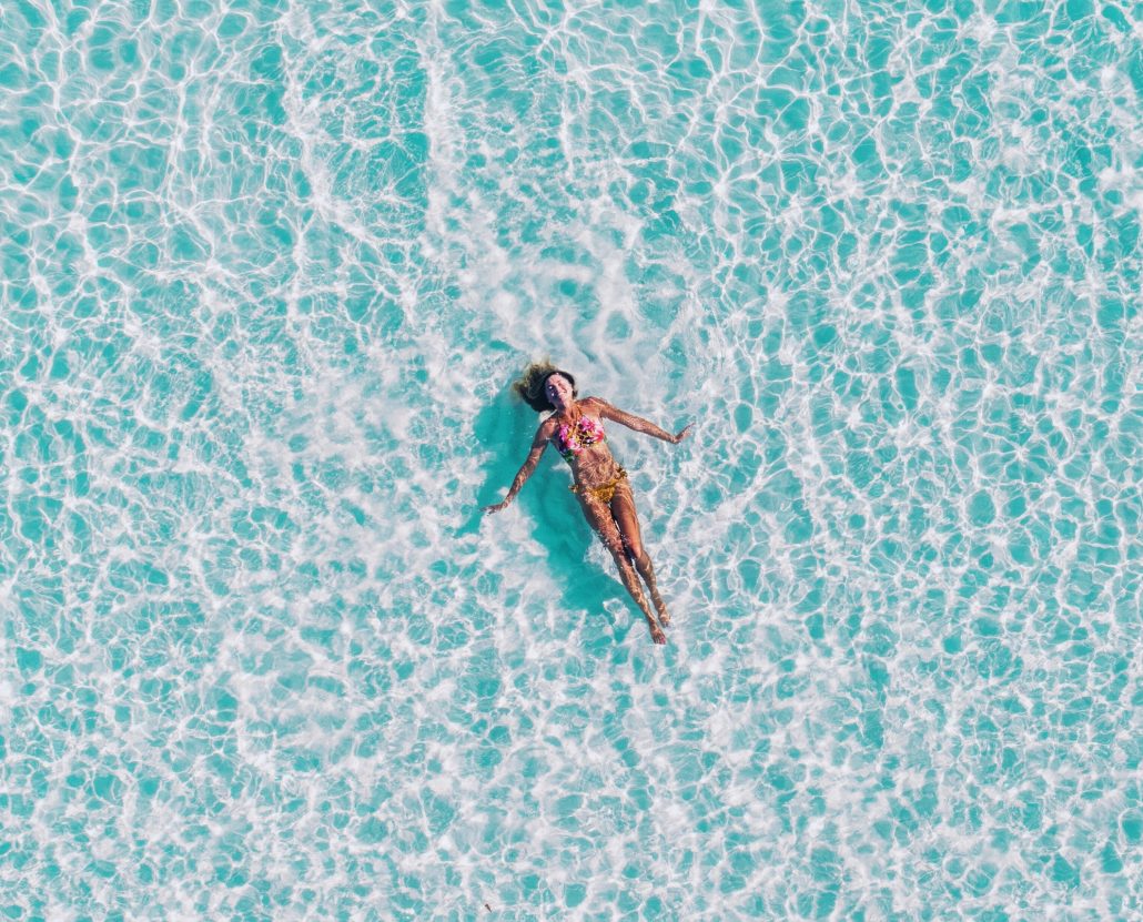girl in ocean floating