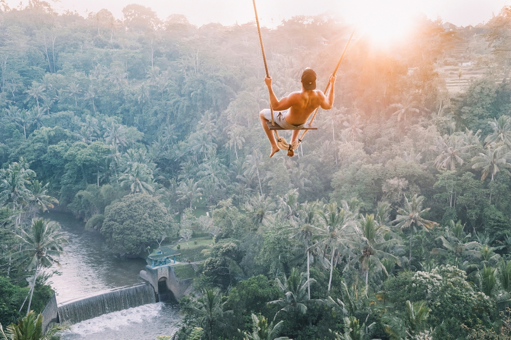 guy swinging in bali ubud