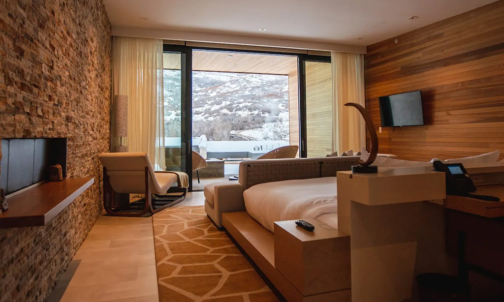 earth suite deluxe bedroom at the lodge at blue sky
