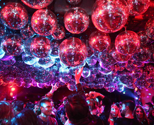 sunset at edition disco balls and dancing