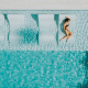 girl lounging in pool