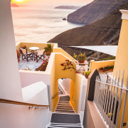 stairs overlooking cliffs and ocean in greece