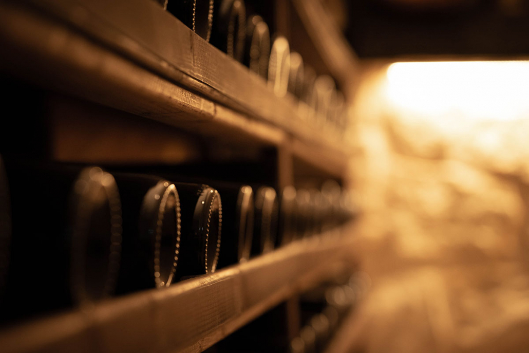 wine bottles in cellar wine country