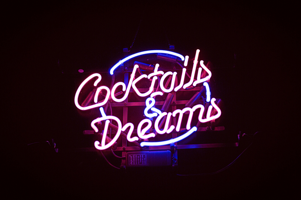 cocktails and dreams neon sign best bars in austin