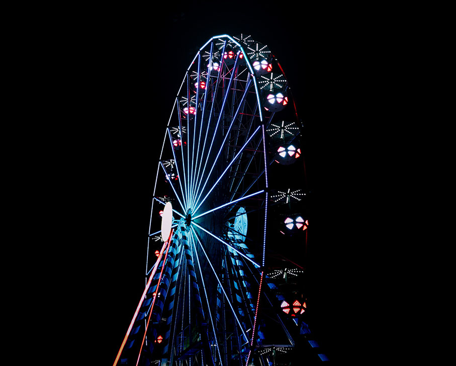 dance in the desert at the neon carnival ferris wheel