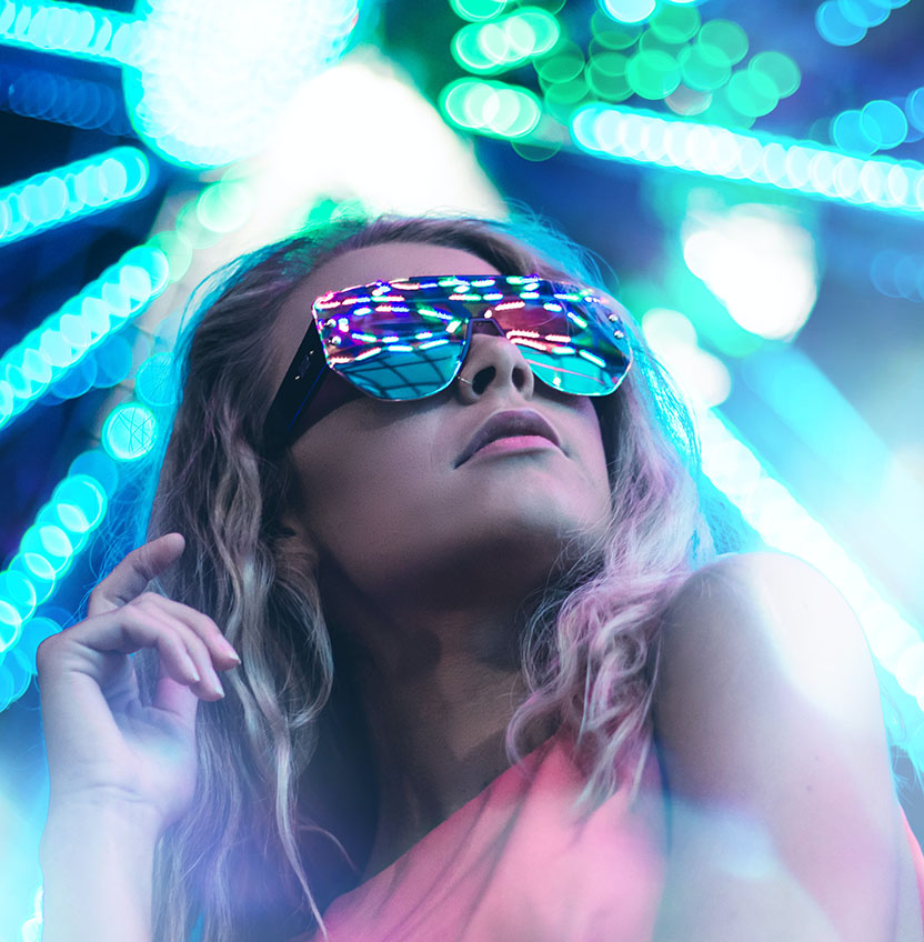 dance in the desert at the neon carnival girl with glasses