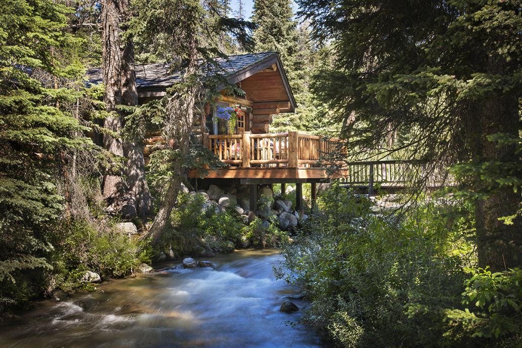 lone mountain ranch cabin on the stream