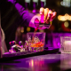 best bars in hollywood for a night out bartender pouring drinks