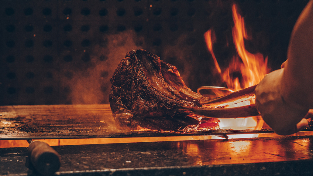 steak on the grill fire