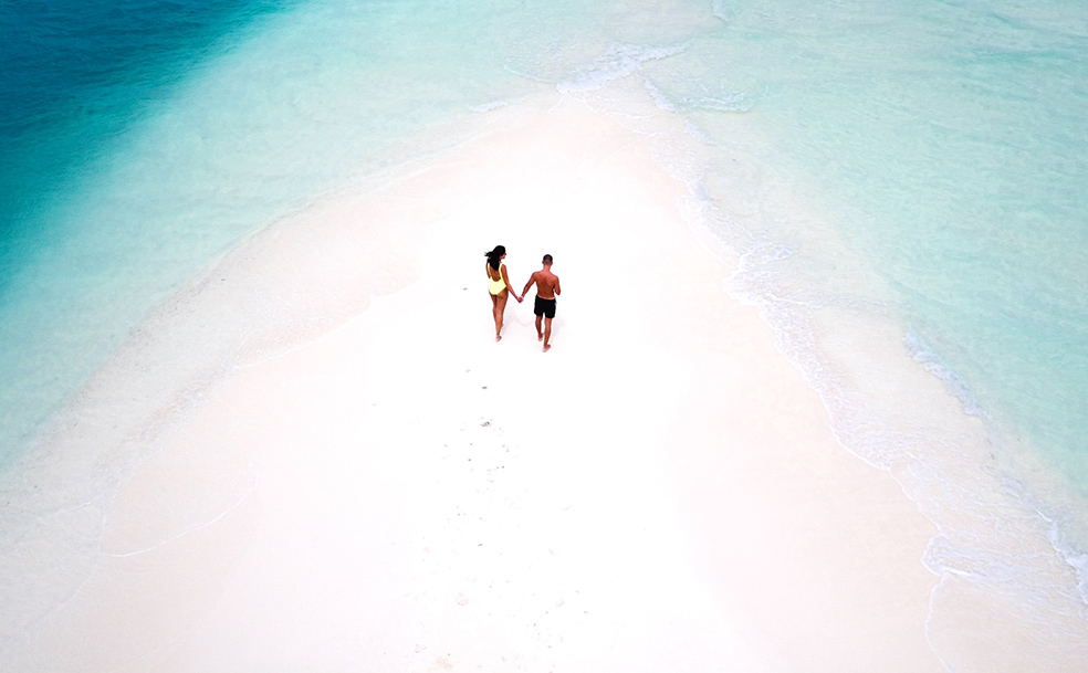 couple walking on the beach